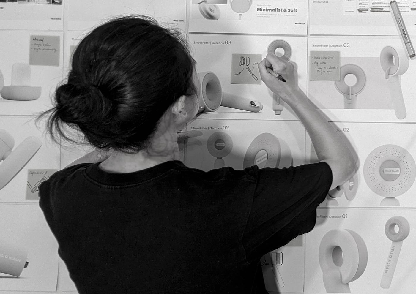 Jinni Zhang at the concept wall, mid-project